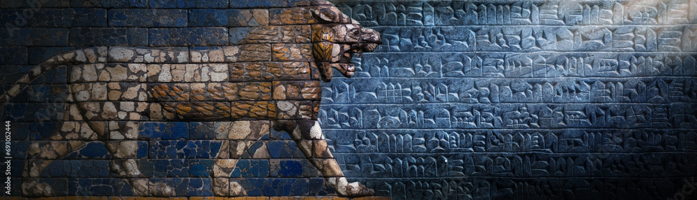 Poster ancient cuneiform sumerian text and relief of a lion, a mythical assyrian deity. historical backgrou