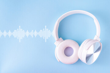 Sound Therapy Mental Health and Wellness concept. Light blue background with laptop and headphones...