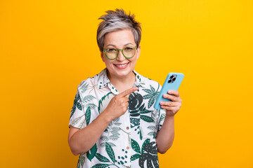 Photo portrait of nice pensioner lady point hold telephone promo wear trendy tropical print outfit...