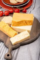 British cheeses collection, Scottish coloured and English matured cheddar cheeses