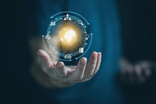 Businessman hand showing transformation of ideas and the adoption of technology in business in the digital age, enhancing global business capabilities Ai, IoT, internet of things. 