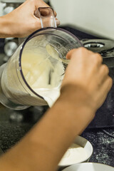 homemade mayonnaise. Spread the mayonnaise on white plates. Concept of homemade food. Healthy.