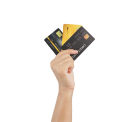 Hand holding many credit cards.