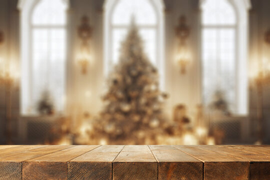 Wooden desk of free space and home interior with window and christmas tree. 