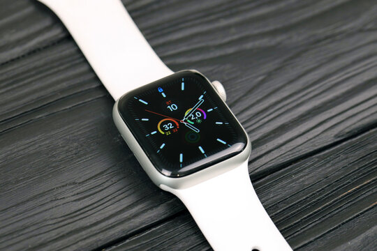 KYIV, UKRAINE - 4 MAY, 2023: Apple Watch series five 5 on black background close up