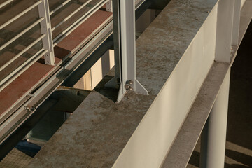 construction detail of the white painted steel structure with bolts and brackets. elegantly painted white, where bolts and brackets create a combination of resistance and design. Architectural Detail