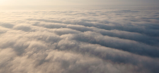 Morning Majesty: Awe-Inspiring Dawn High Above the Clouds