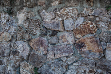 Grunge wall background with old stones texture