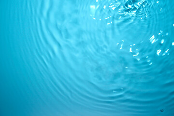 The surface of the water is transparent blue.