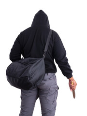 An unidentified male criminal wearing a black hoodie and covering his face, holding a sharp knife...