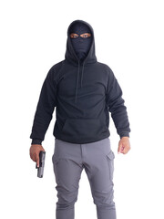 Unidentified male criminal wearing a black hoodie and covering his face, holding a pistol and aiming. On a white background with cliping path. thief.weapon, crime.burglar,cat paw,burglar