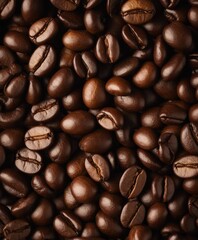 Obraz premium close up view of dozens coffee beans, above view 