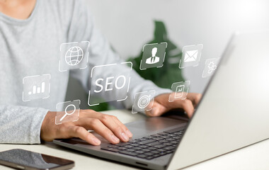 SEO Concept. using a computer with SEO icon for analysis SEO Search Engine optimizing internet technology for business company. Optimization Internet Website Traffic Ranking..