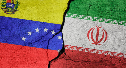 Venezuela and Iran flags on a stone wall with a crack, illustration of the concept of a global crisis in political and economic relations