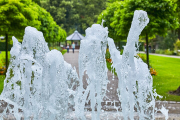 Idyllic park with fountain, close-up.