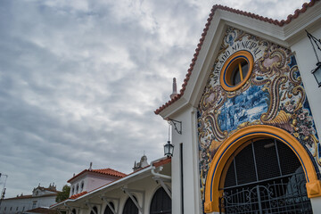 Facade and entrance to the municipal market with tiles of typical scenes from the region and inscription, Santarém PORTUGAL