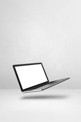 Floating computer laptop isolated on white. Vertical background