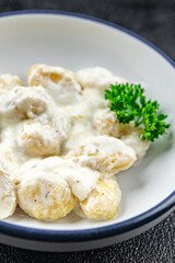 gnocchi cream cheese sauce potato dough second course fresh delicious healthy eating cooking appetizer meal food snack on the table