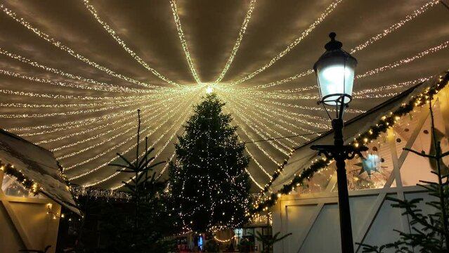  Decorated for Christmas holidays, Denmark, Copenhagen , Viborg, Shopping street in historical center of Aarhus decorated for New Year holidays, Pedestrians Christmas shopping on Stroget at night.