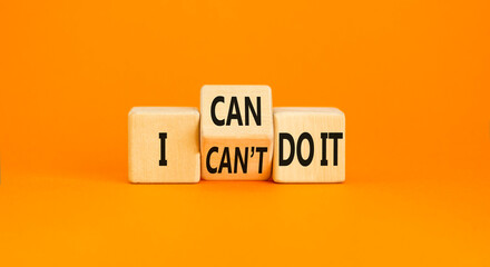 I can do it symbol. Concept word I can or can not do it on beautiful wooden cubes. Beautiful orange...