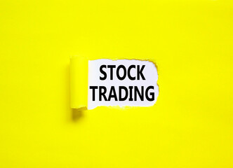Stock trading symbol. Concept words Stock trading on beautiful white paper. Beautiful yellow paper background. Business stock trading concept. Copy space.