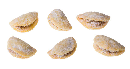 Set of sweets with yummy nut filling in shell shape isolated on a white background. Closeup of...