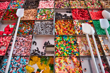 different types of gummy sweets from a stall at a village festival, gluttonous, jelly, sugar