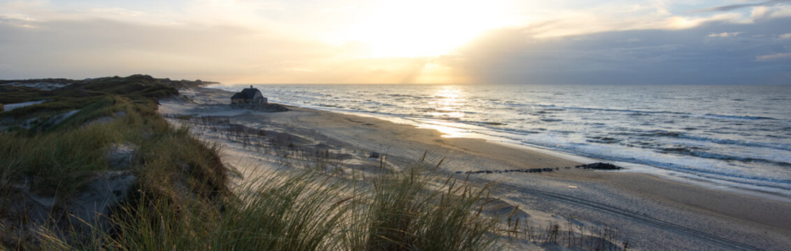 Panoramic view to Gammel Skagen coast with beach home.