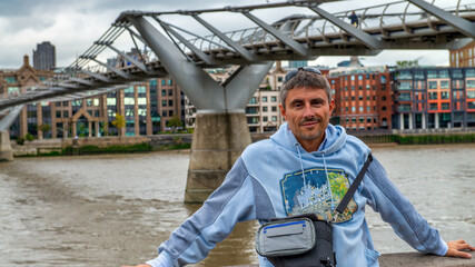 A happy male tourist in London, UK