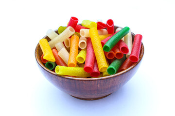 Mixed colour fryums in a wooden bowl on white background 