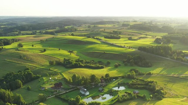 Aerial landscape with green fields and hills	