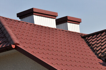 Chimney on the roof of the house.