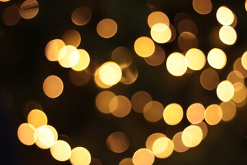 yellow lights on black background blurred, christmas, bokeh