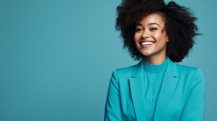 happy black woman with blue shirt and a blue background - obrazy, fototapety, plakaty