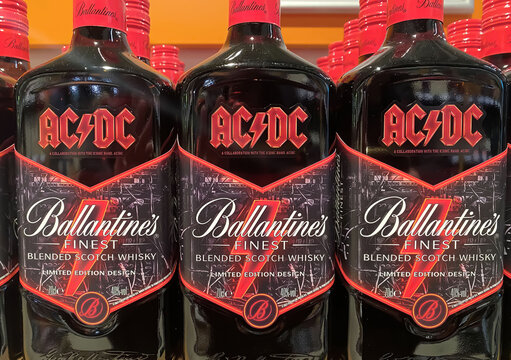 Viersen, Germany - December 9. 2023: Closeup of Ballantine s whisky bottles, special edition design of rock band AC DC