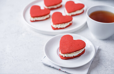 Red velvet whoopie pies in the form of heart for Valentine's day in a plate