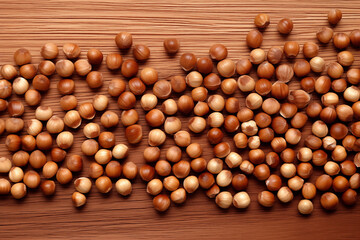overhead view of hazelnuts on wooden table, food, flat lay, ai-generated image