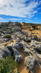 The Almograve Beach With Black Basalt Rocks in Alentejo Coast, Portugal. In the Footsteps of Rota Vicentina. Hiking Fisherman Trail.