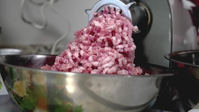Close up from grounding pork meat for sausages