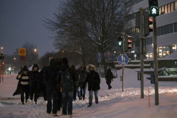 Snow and people in Espoo and Helsinki, Finland.