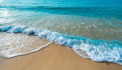 beautiful soft blue ocean wave on fine sandy beach