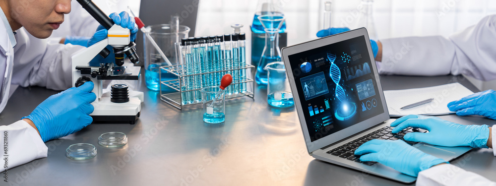 Poster dedicated scientist group working on advance biotechnology computer software to study or analyze dna