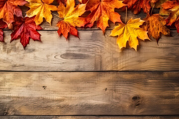 Naklejka na ściany i meble Autumn canvas, Yellow maple leaves on a wooden background, offering text and design space. A warm and versatile concept capturing the essence of fall in stock photos.