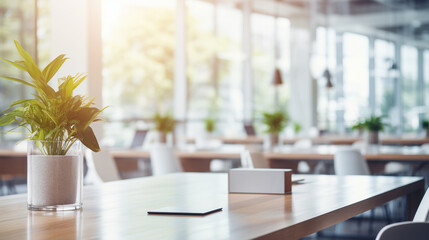 Beautiful blurred background of a light-filled modern office interior, featuring sleek furniture and subtle decor, creating a serene and professional workspace.