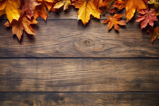 Autumn canvas, Yellow maple leaves on a wooden background, offering text and design space. A warm and versatile concept capturing the essence of fall in stock photos.