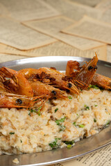 Delicious shrimp açorda served in a restaurant, a traditional Portuguese dish with savory flavors.