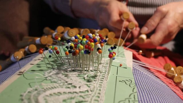 threade wisdom: octogenarian's bobbin lace mastery