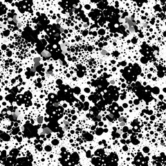 Abstract drawing of blots, splashes, drops and circles with black and gray paint on a white background. Animal style spots.