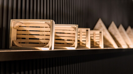 bamboo steam trays on display at chinese restaurant (asian fusion cuisine) food service tray, dumpling serveware, wooden box, rectangle, triangle, rectangular, triangular, close up abstract asia