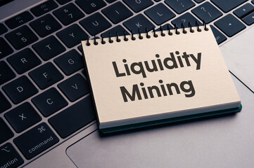 There is notebook with the word Liquidity Mining. It is as an eye-catching image.